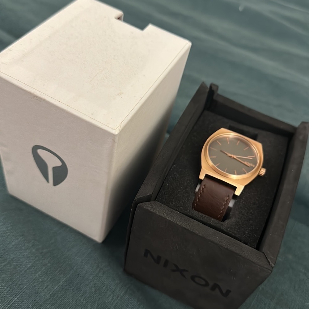 Nixon time teller in rose gold tone and brown leather